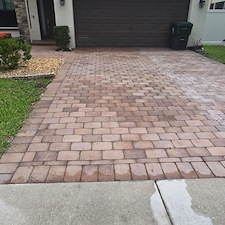 Pressure-Washing-Driveway-Oil-Stain-and-paint-removal-from-paver-driveway-located-at-Greenacres-FL-33415 7